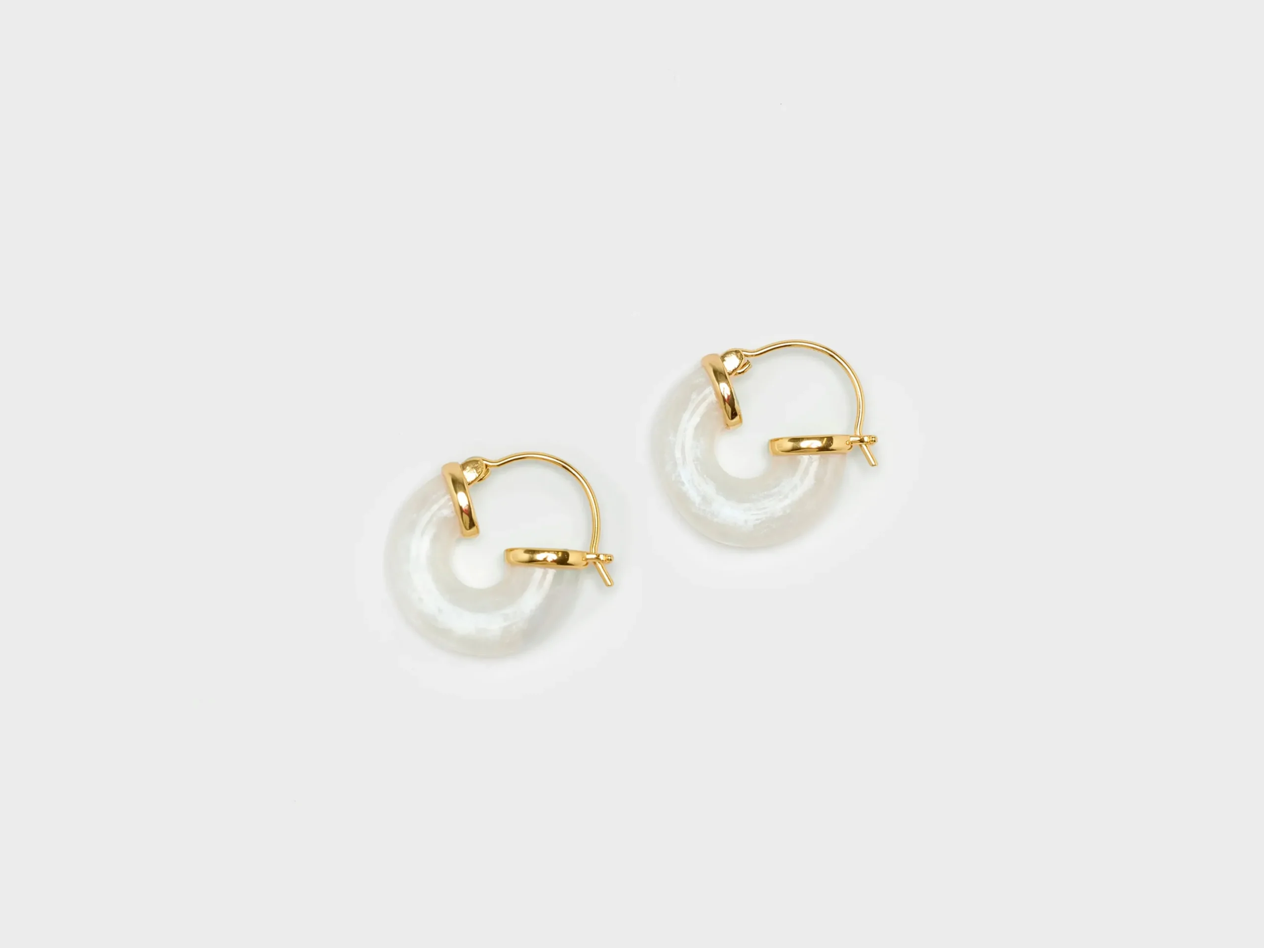 anni_lu_petit_white_swell_0.webp Anni Lu Petit White Swell Hoop Earrings